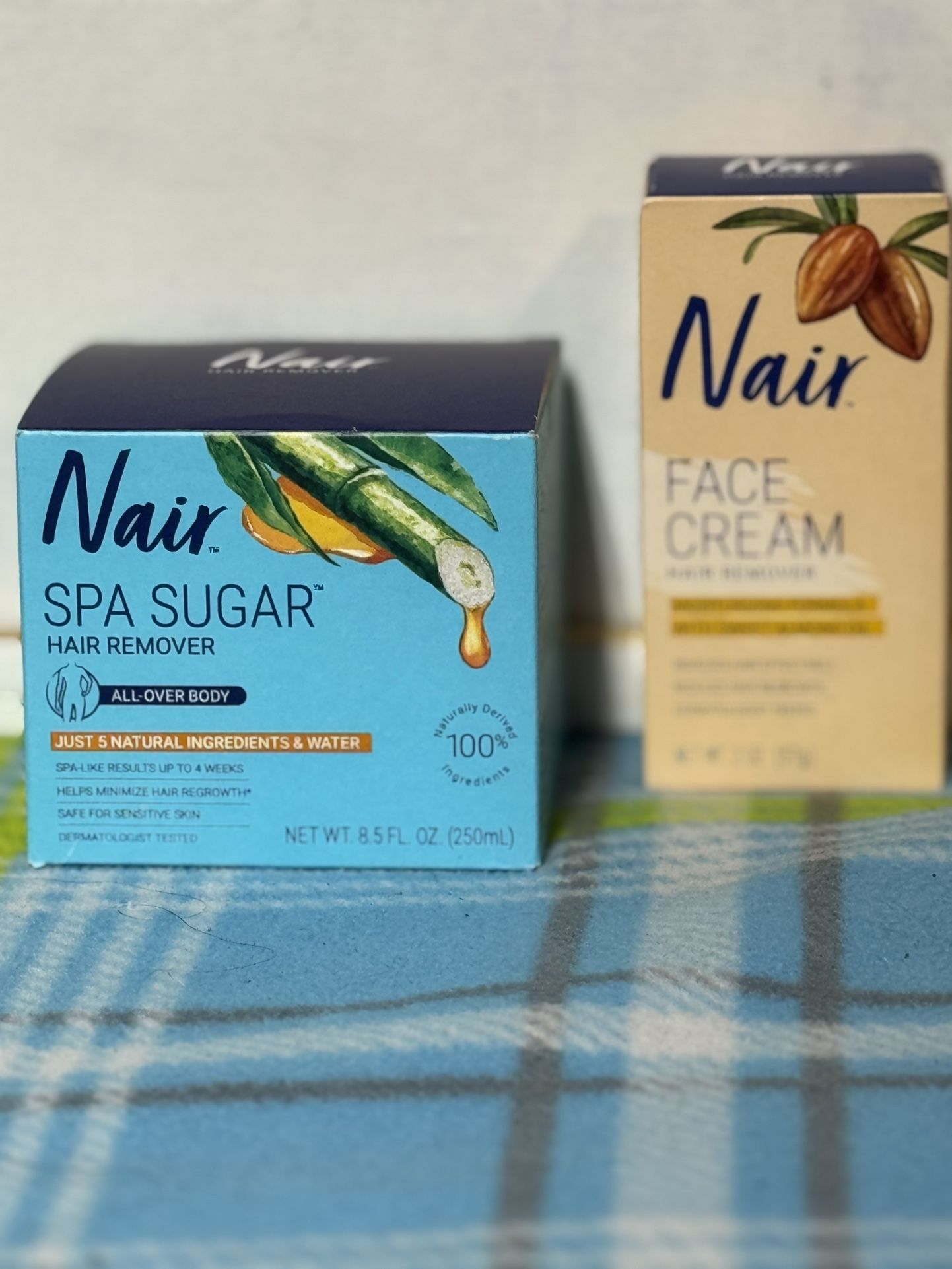 Nair spa sugar, scrub, and face cream