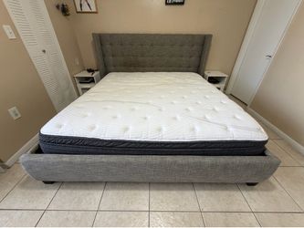 King size bed frame with mattress included.
