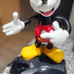 Mickey Mouse Vintage Disney Telemania Animated Talking Cordless Phone, receiver and power cord only. 
In very good pre-owned condition.