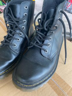 Sturdy black leather boots with yellow stitching. Dr. Martin’s boots size 7 Black Leather $30 Located Mount Dora Fla 32757