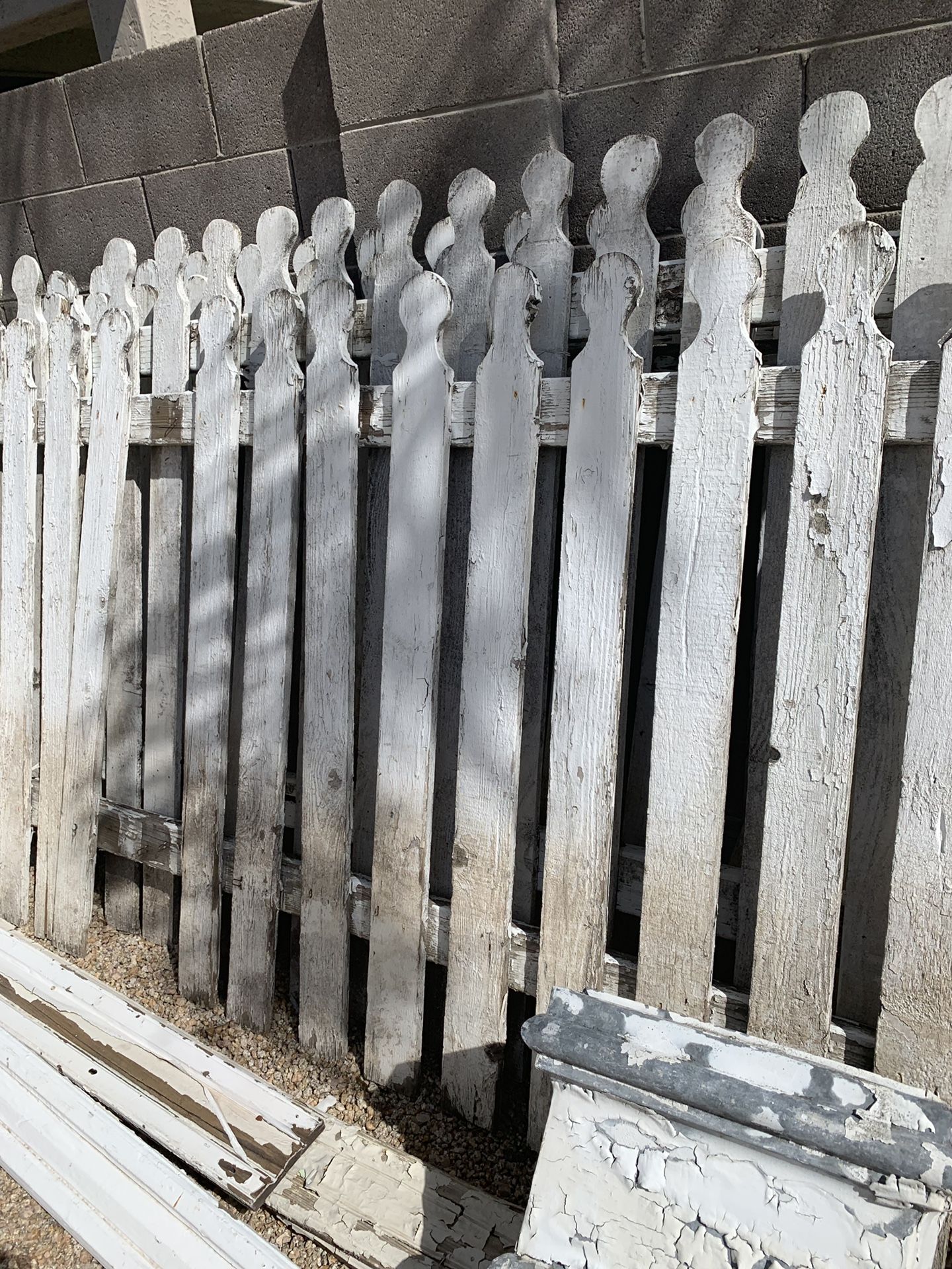Chippy white old picket fence panels