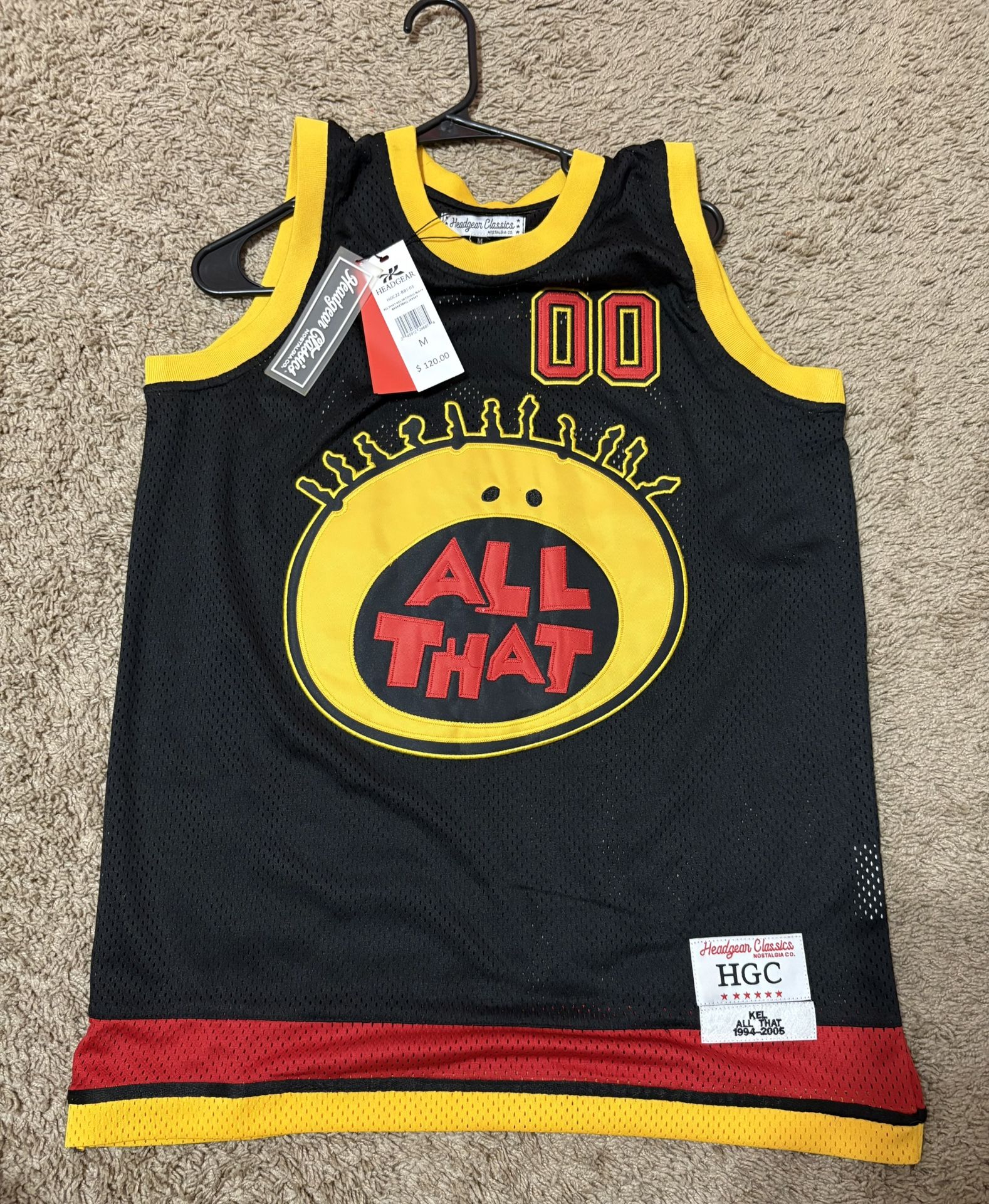 Black with yellow and red accent kel all that jersey