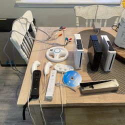 Nintendo Wii , 3 consoles, 1 power cord  1 av cable , 2 component cables, 1 game, and accessories shown. Pick up in orting 