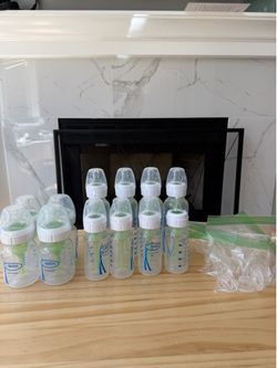 27 lightly used baby bottles