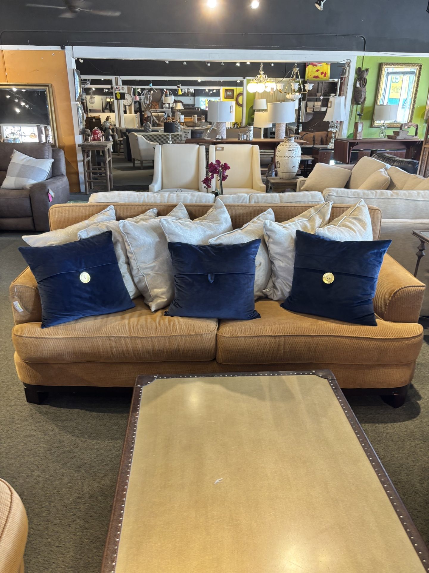 Caramel Sofa w/ 7 ivory square pillows As Is (missing back cushions) SKU: EU5KL3