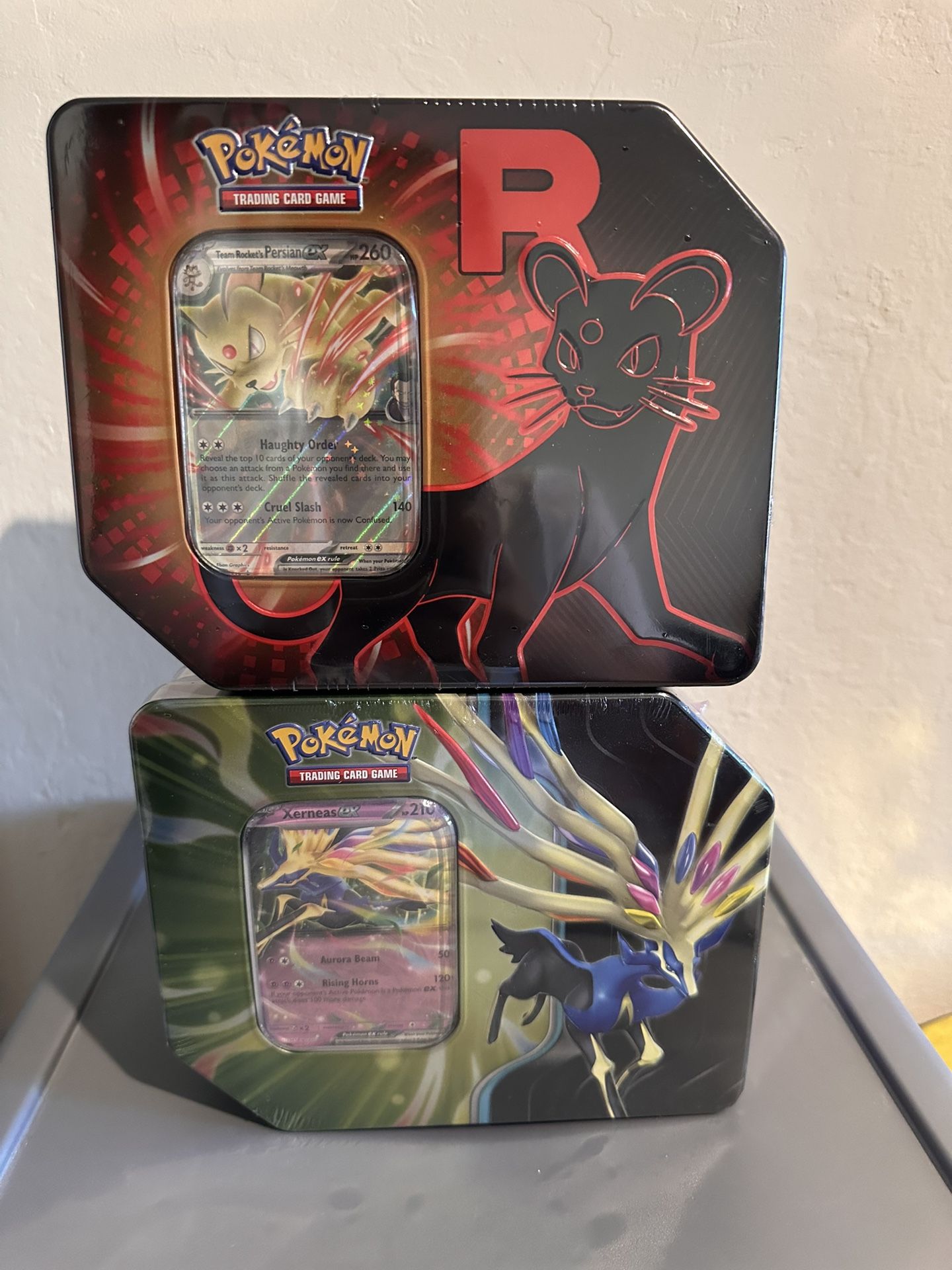 Pokemon Xerneas Ex Tin And Team Rocket’s Persian Tin