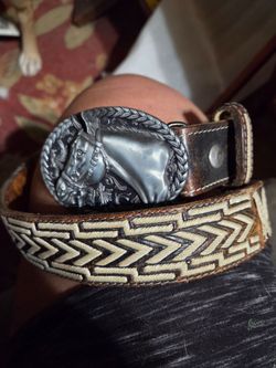 Leather belt with horse buckle