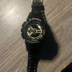 Black And Gold G shock watch