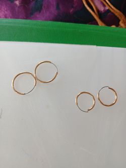 Two pairs of hoop earrings