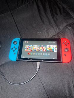 Nintendo’s switch 1 with games and sd card