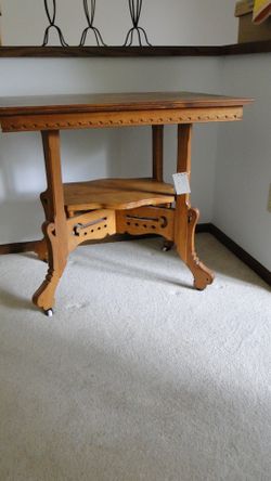 Vintage Light Oak Table With Shelf And Porcelain Casters