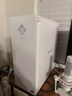 Gaming PC with monitor, microphone, and keyboard