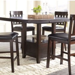 Ashley Furniture: Haddigan Counter Height Extendable Dining Table