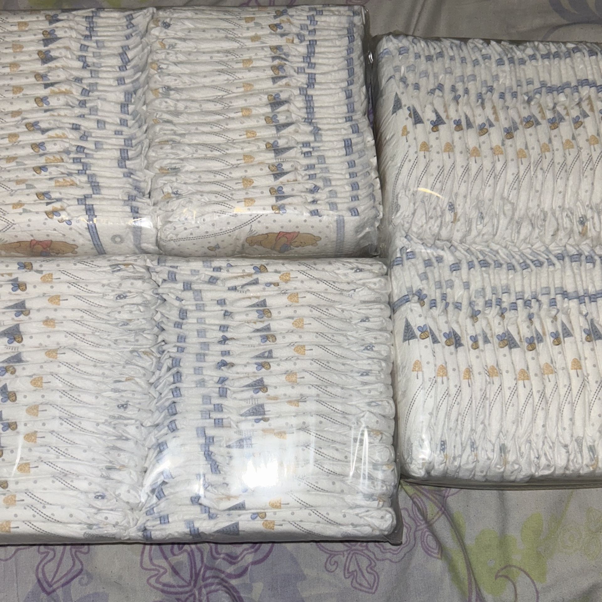 3 size 1 unopened pack of diapers