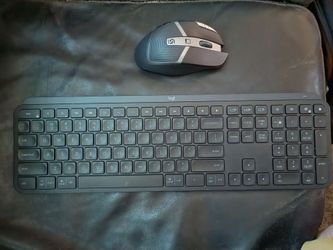Mx keys keyboard and Logitech g602 wireless gaming mouse.