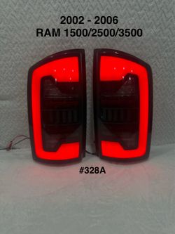 2002 To 2006 Dodge RAM 1500 / 2500 / 3500 Red LED Bar Tail Lights (Smoked)
