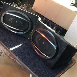 Pair of pioneer 6/9 4-way car speakers mounted in boxes