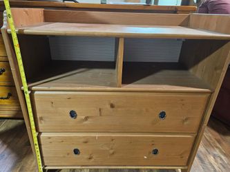 Wooden changing table with drawers