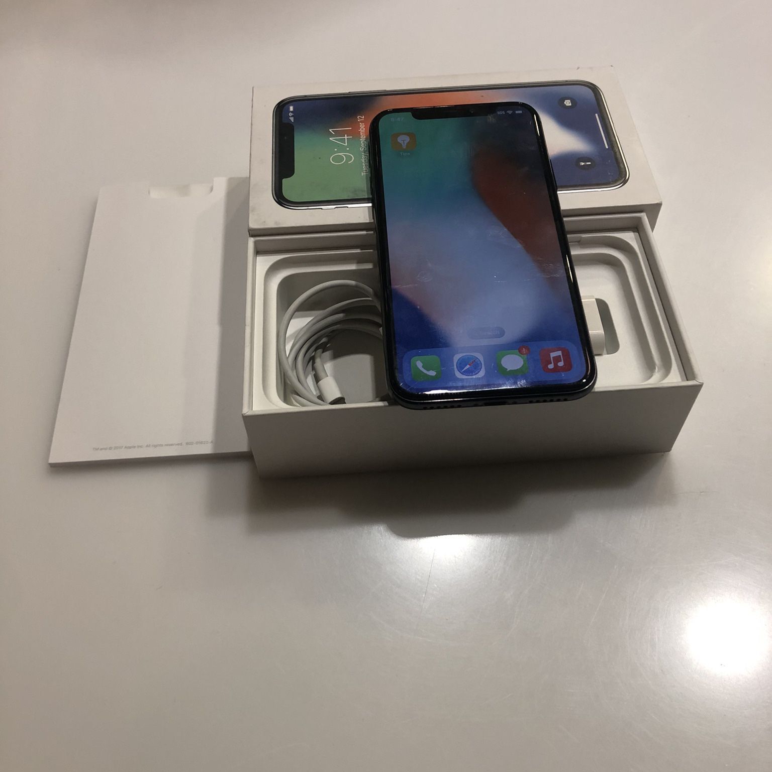 Unlocked iPhone X 64 GB- Grey Plus Two Apple Watches. Bundle Deals Only