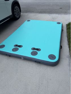 AWSUM brand inflatable floating dock platform designed for water activitie