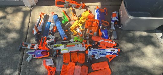 15 nerf guns with 13 extra magazines
