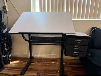 Adjustable drawing table