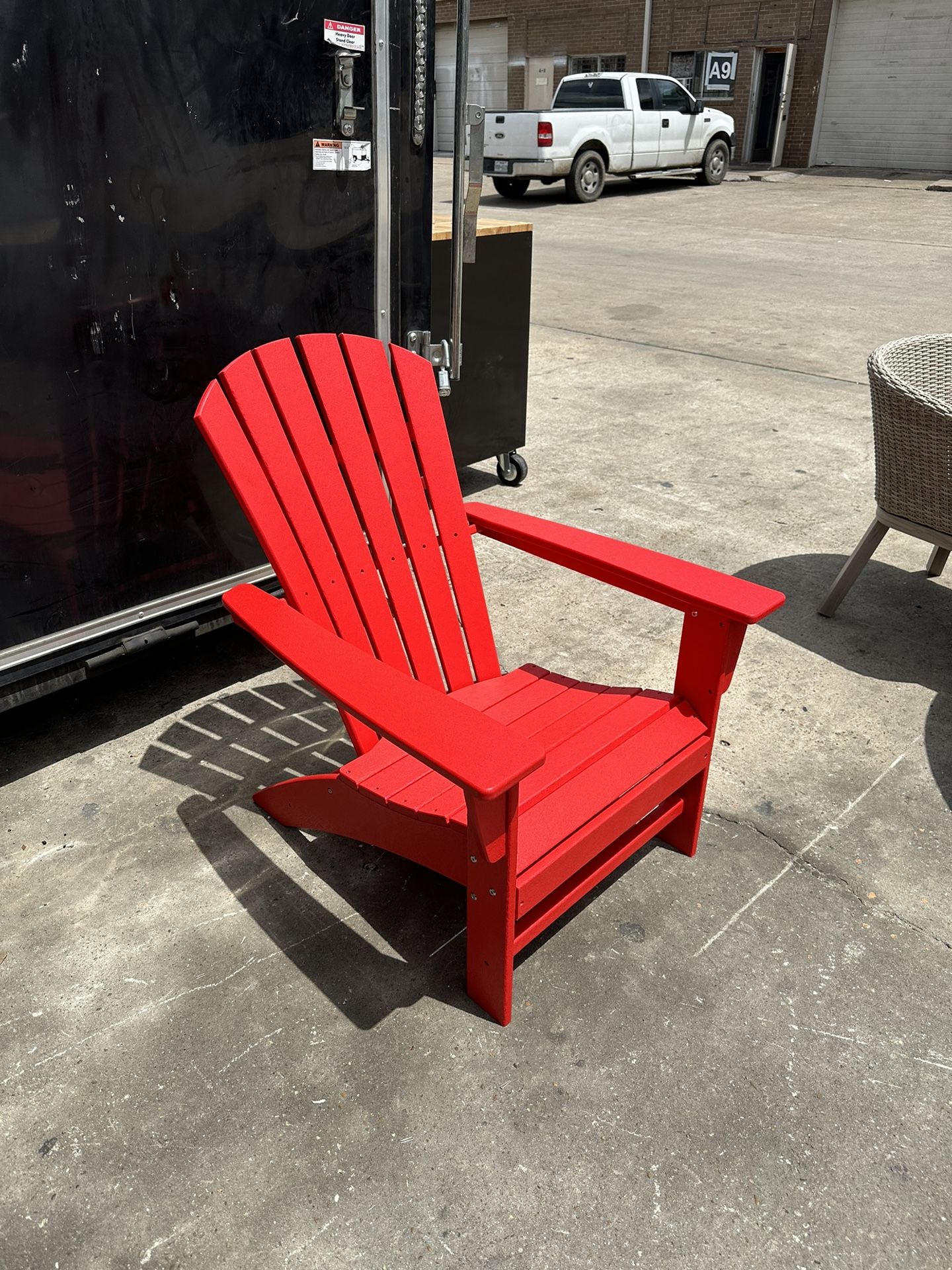 POLYWOOD Grant Park Traditional Curveback Sunset Red Plastic Outdoor Patio Adirondack Chair