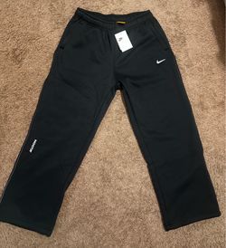 Black reflective Nocta sweatpants