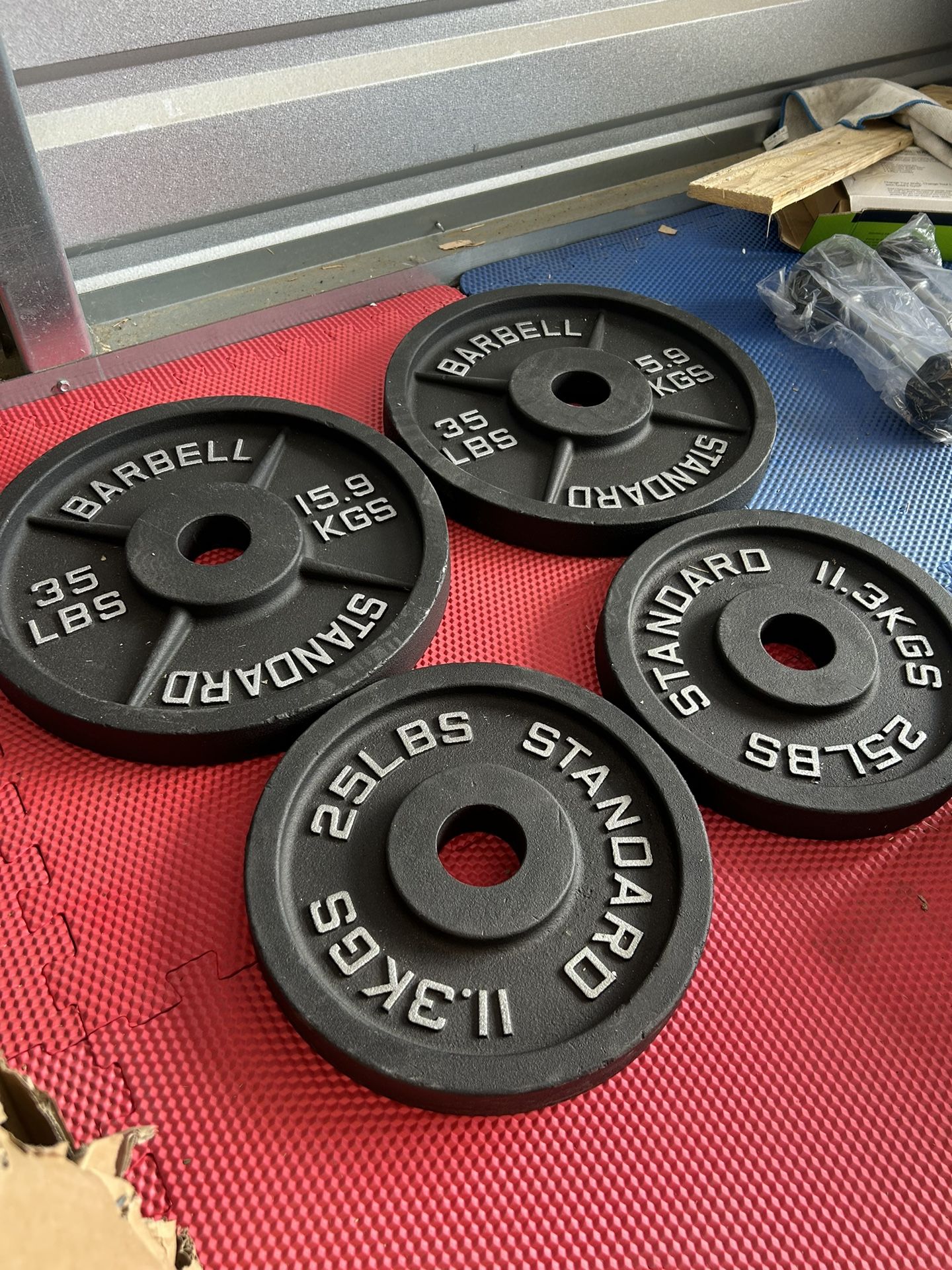 New pair of 25 and 35lb iron olympic plates $120