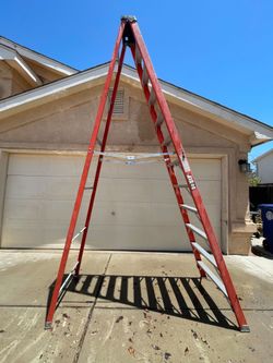 12 ft fiberglass A frame ladder.