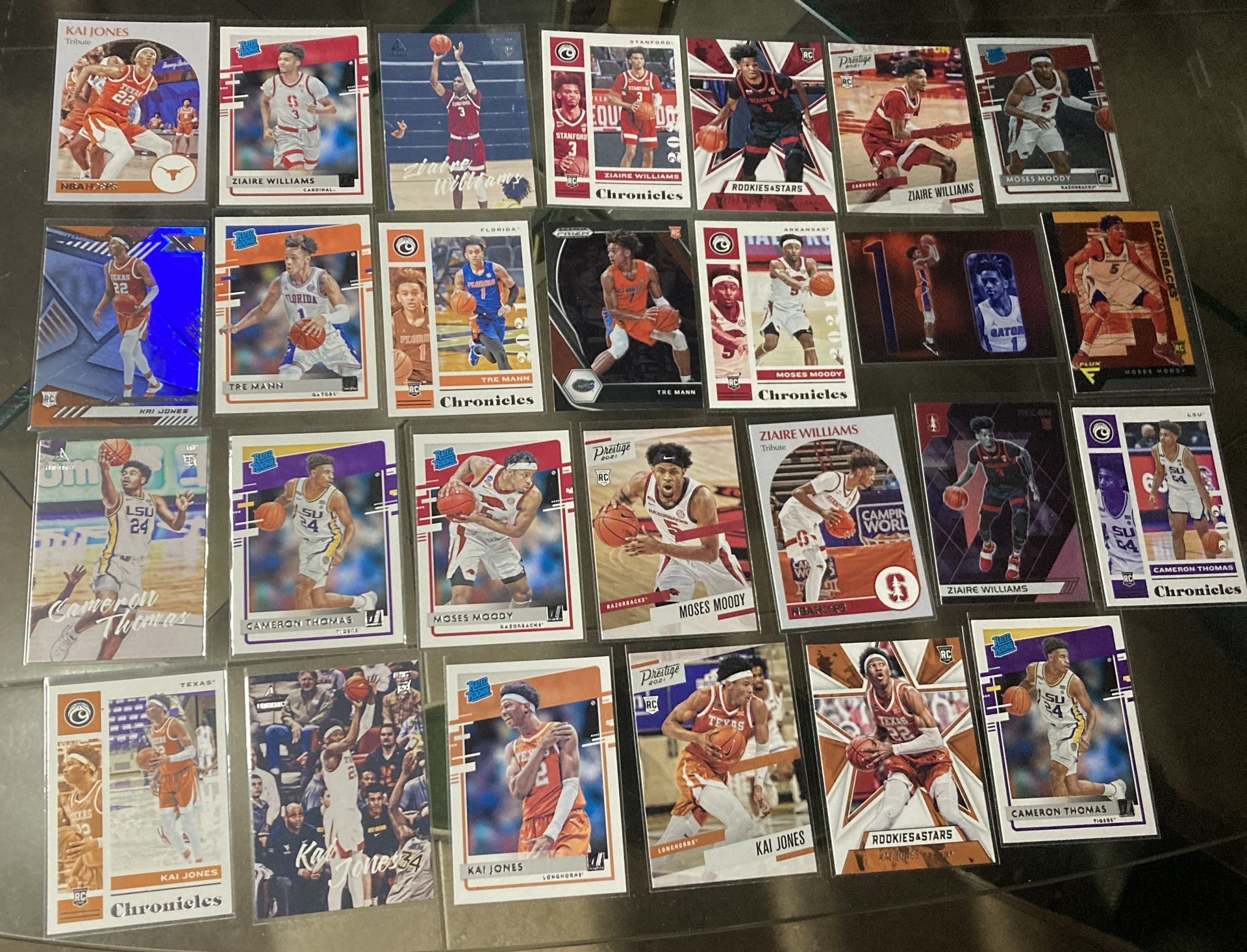 27 card NBA basketball rookie card lot Zaire Williams Kai Jones Tre Mann Moses Moody Cam Thomas etc!All cards are In good condition near mint to mint