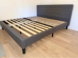 Gray upholdered platform king bed frame