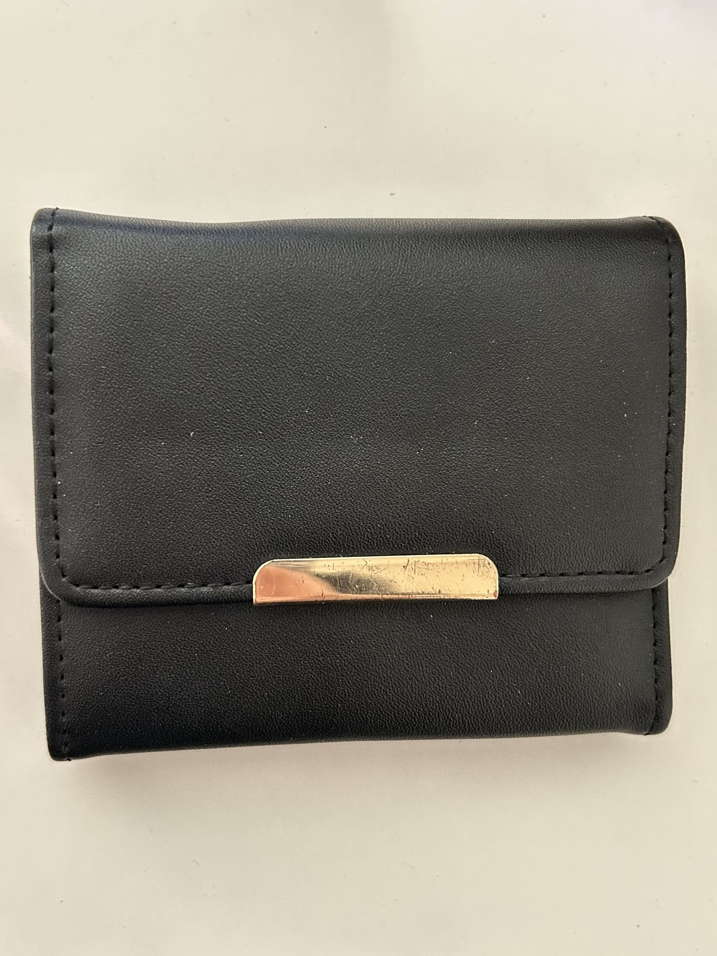 Black Tri-Fold Wallet with Gold Accent