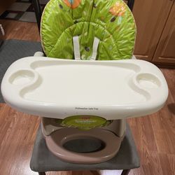 Fisher-Price SpaceSaver High Chair. This compact high chair is designed to strap securely onto most standard dining chairs