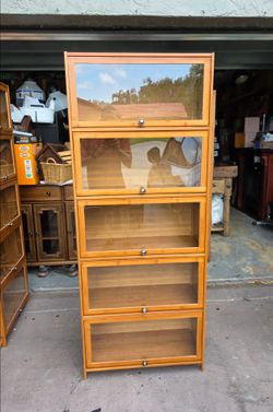 One wooden cabinet/Bookcase with Acrylic Doors
Cabinet wider
27"W x 68"T x 12.5"deep