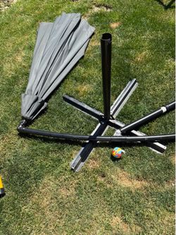 Large tiltable outside umbrella