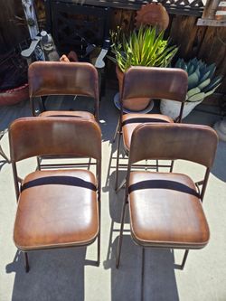 Lot Of 4 Brown Folding Samsinite Chairs