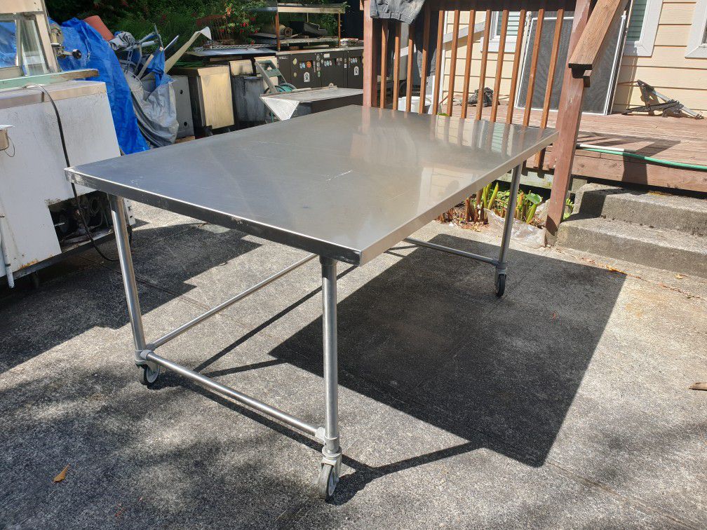 4x6 very sturdy stainless steel work table on wheels