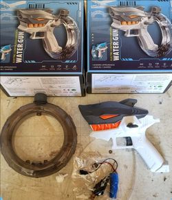2 New in Box Shark Electric Watter Guns. Rechargeable