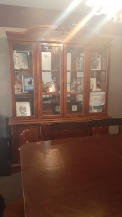 Table with 6 chairs and matching china