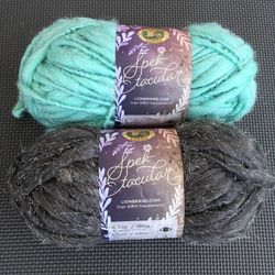 Lot of 2 Lion Brand Spektacular Bulky Thick and Thin Glittery Yarn