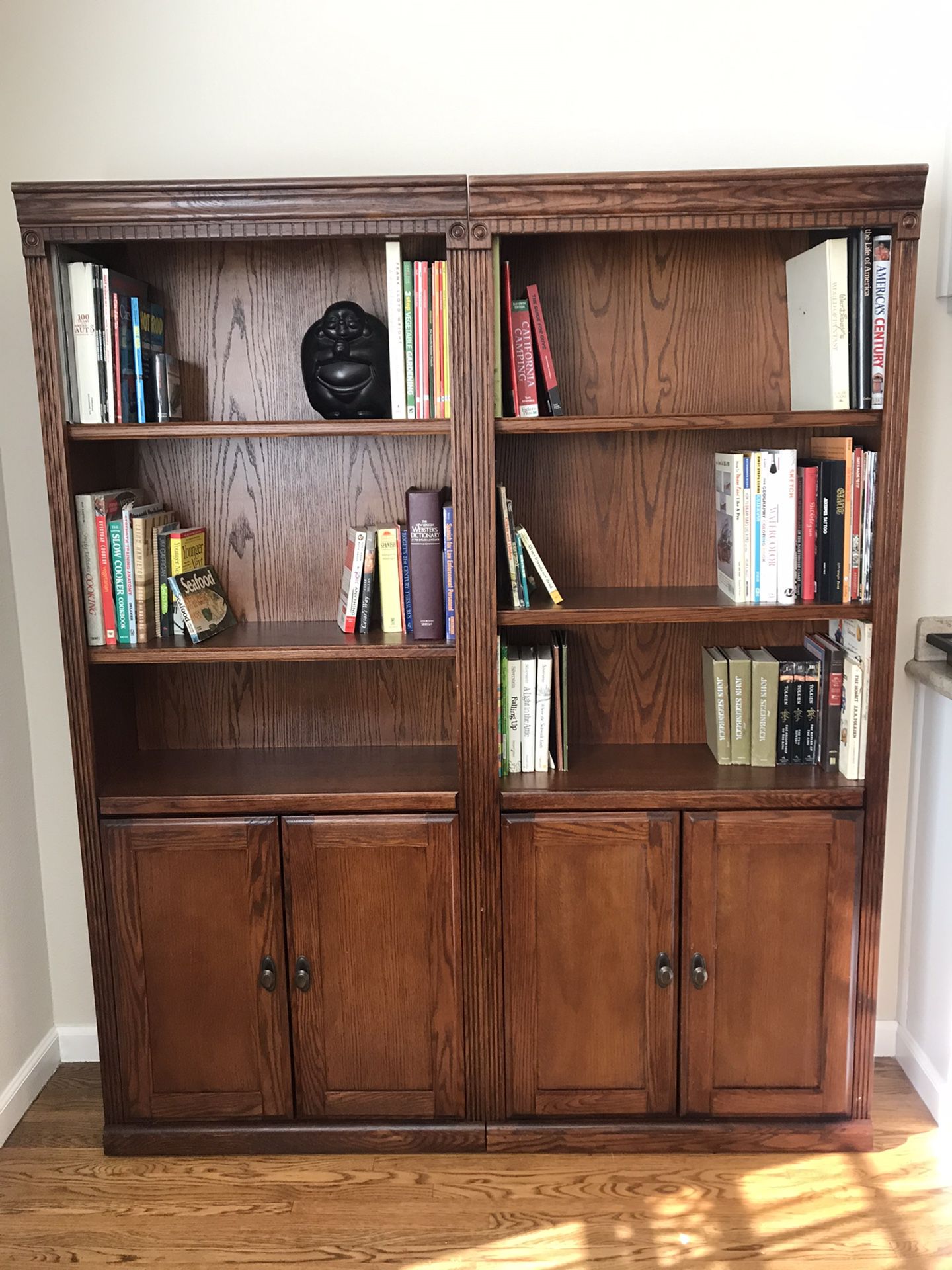 Matching wood book shelves with storage cabinets