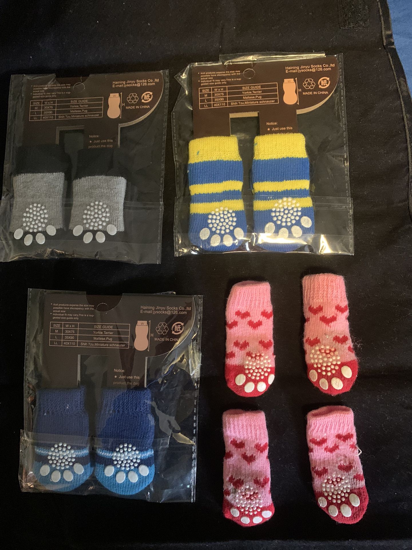 4 Pairs 16 Dog Socks Multicolor Socks Size M.