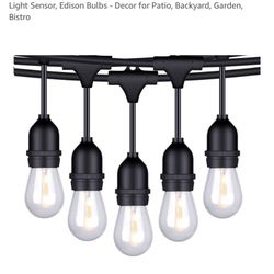 Foxlux String Lights - 48 ft LED Outdoor String Lights - Shatterproof, Waterproof Pergola Lights - 15 Hanging Sockets, Light Sensor, Edison Bulbs - De