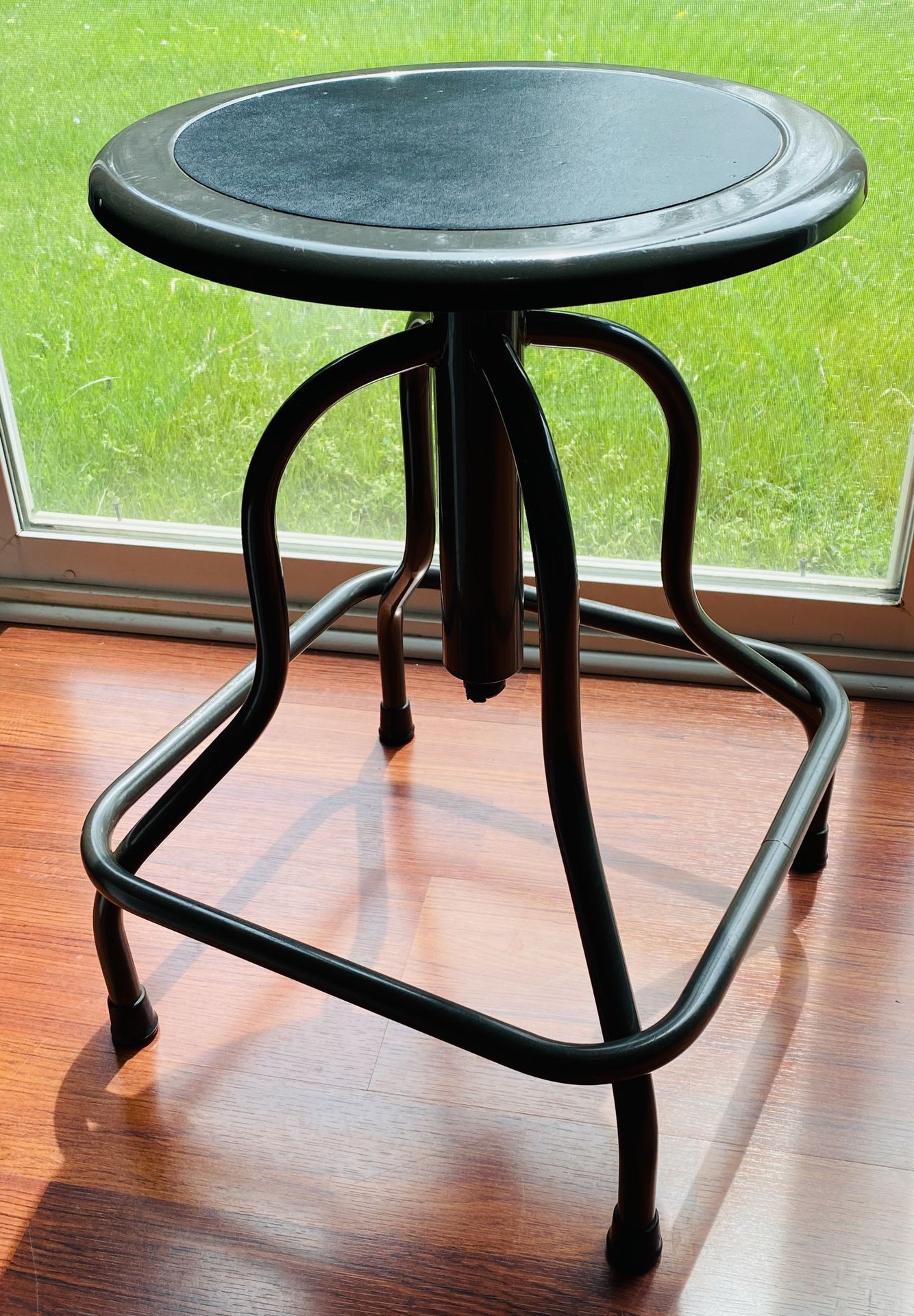 Rotating steel stool. Perfect for your garage, basement, work space, school, laundry room, kitchen, bedroom, desk, and more!