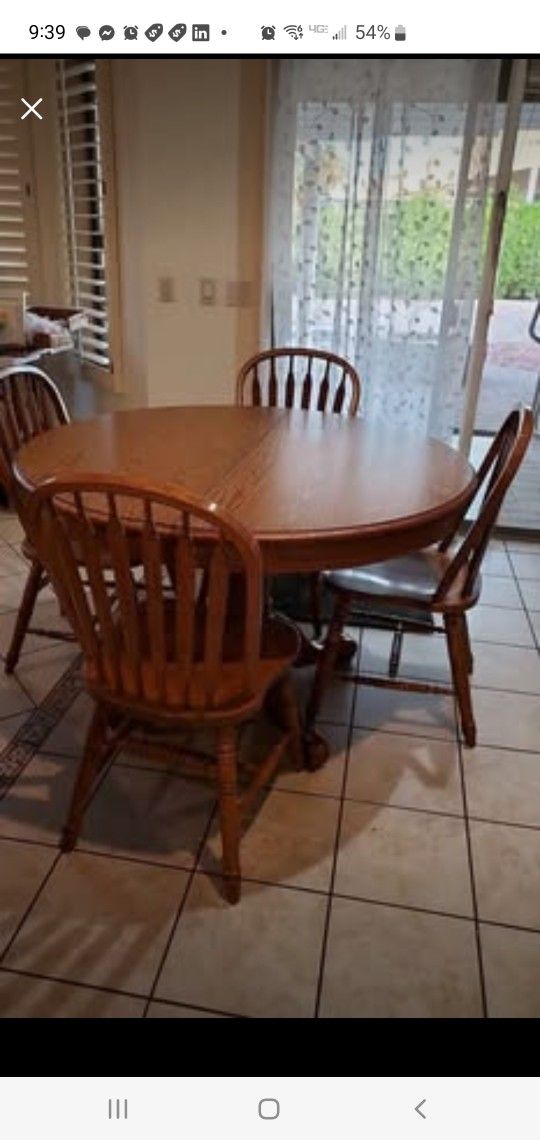 Solid wood pedestal 4-6 seat table formica top, 6 woodchairs