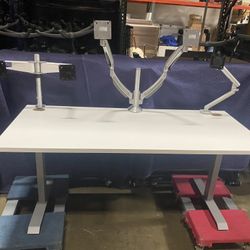 Monitor Arms! We Have Both Single And Dual Arms Available! We Also Have Standing Desks And Herman Miller Chairs Available!
