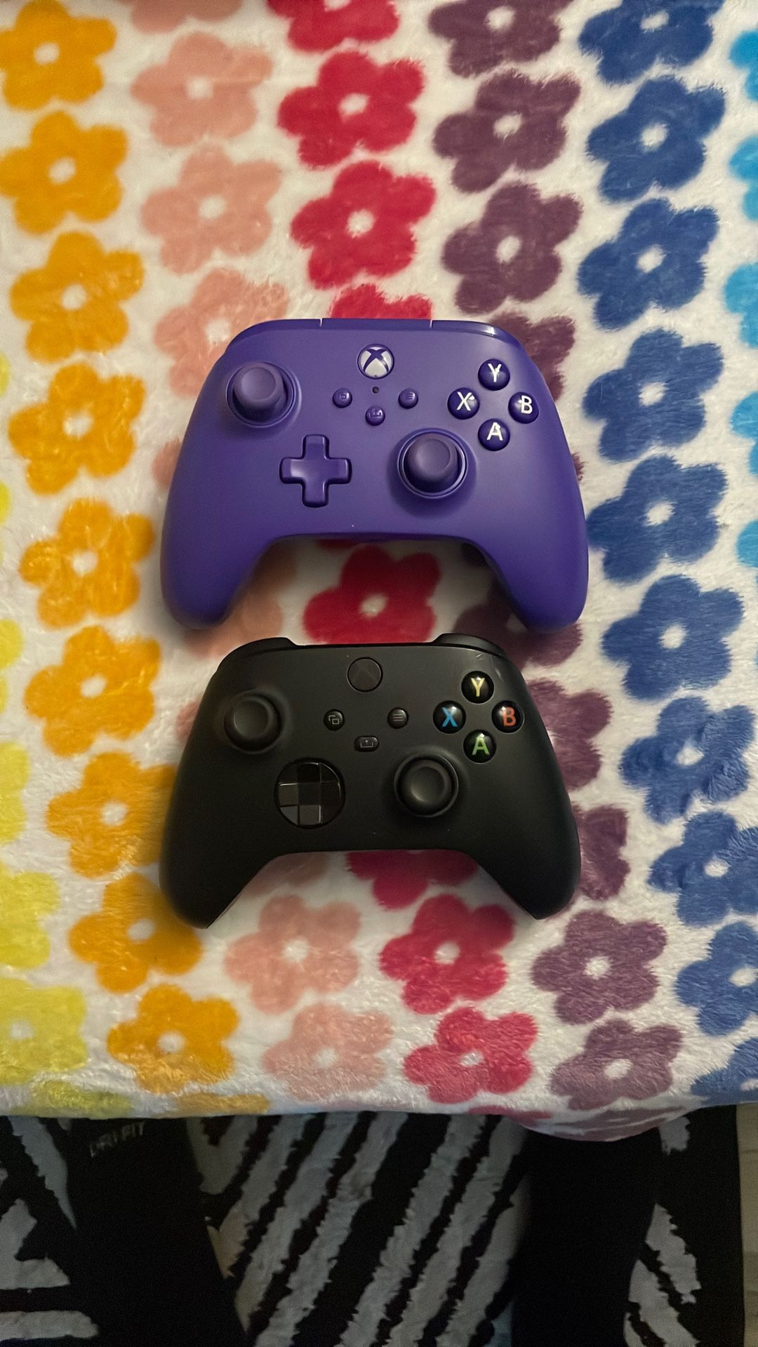 Wired (purple) Wireless (black) Xbox One Controllers
