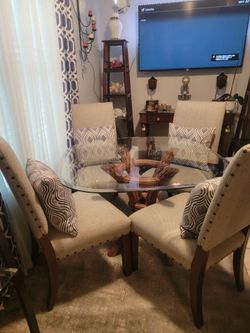 Glass dining table with chairs