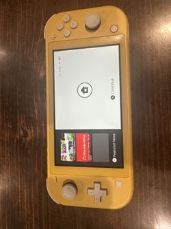 Nintendo Switch Lite W/2 Games